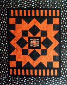 School T-Shirt Quilt - I made this quilt for my oldest granddaughter when she went to the University of Texas.