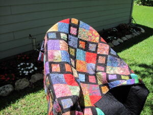 Batik Squares with Piano Key Border Draped